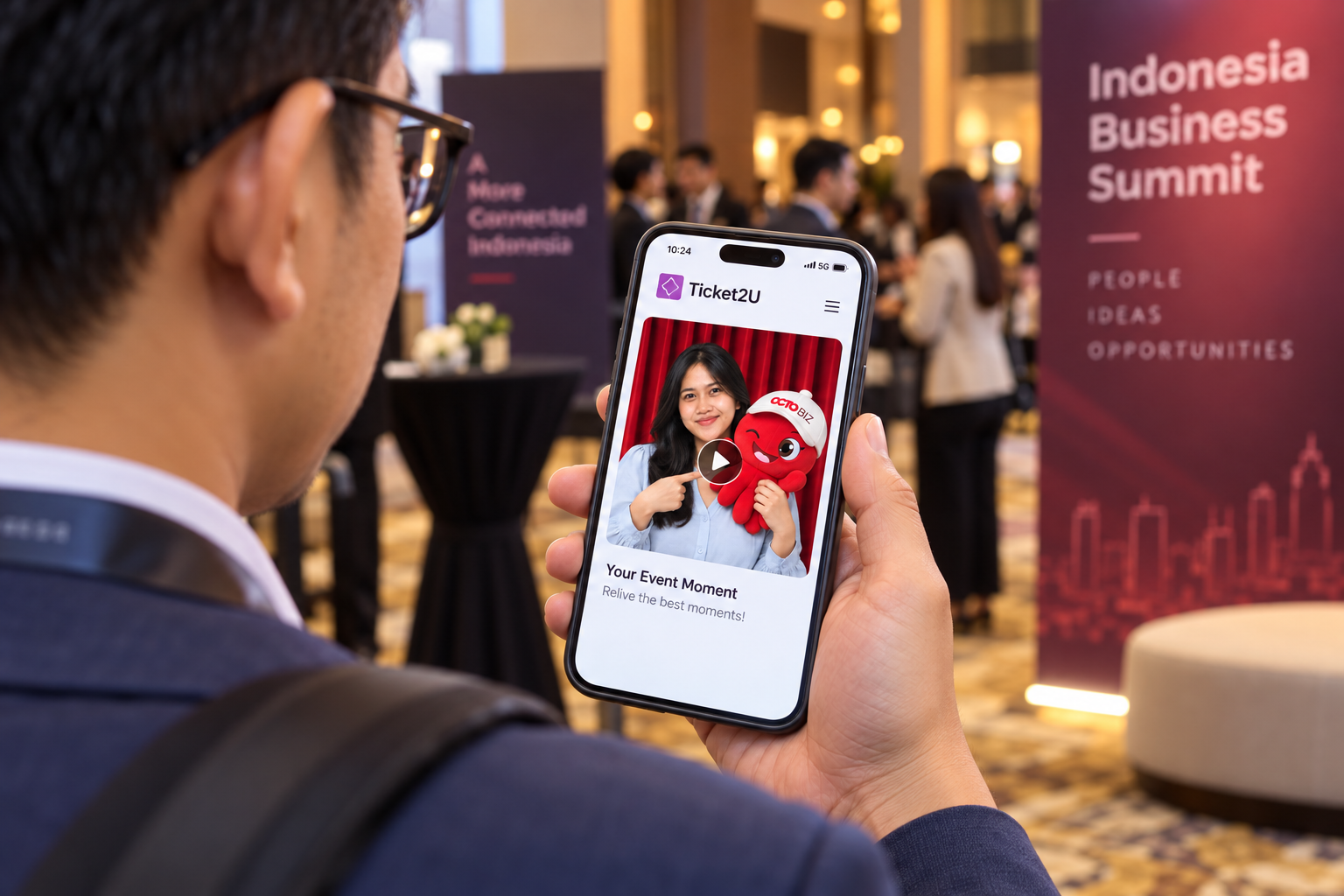 Illustration of a guest holding a phone with a Ticket2U profile and OctoBiz video