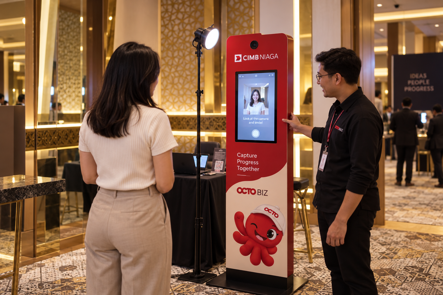 Illustration of a branded OctoBiz photo totem at the summit